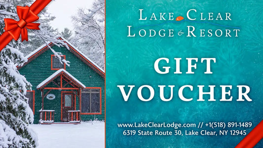Lake Clear Lodge & Resort Gift Voucher design with an image of an Adirondack Cabin during the winter.