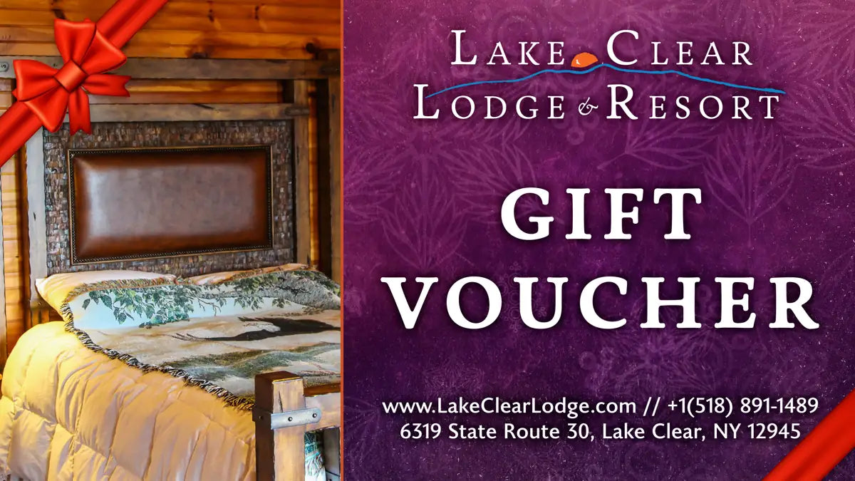 Lake Clear Lodge & Resort Gift Voucher design with an image of a suite bedroom during the winter.
