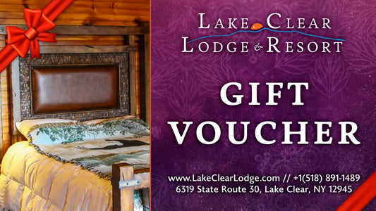 Lake Clear Lodge & Resort Gift Voucher design with an image of a suite bedroom during the winter.