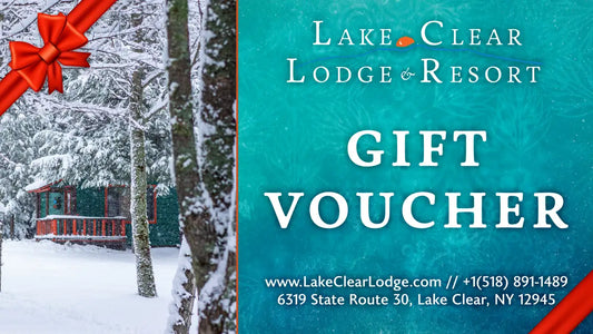 Lake Clear Lodge & Resort Gift Voucher design with an image of a Specialty Cabin during the winter.